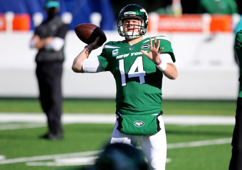 Nov 29, 2020; East Rutherford, New Jersey, USA; New York Jets quarterback Sam Darnold (14) warms up before a game against the Miami Dolphins at MetLife Stadium.