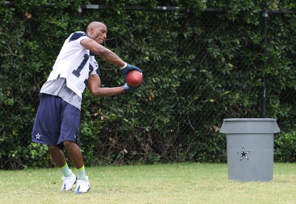 Jun 11, 2010; Irving, TX, USA; Dallas Cowboys receiver Sam Hurd (17) catches footballs in a drill during mini camp at Dallas Cowboys headquarters.