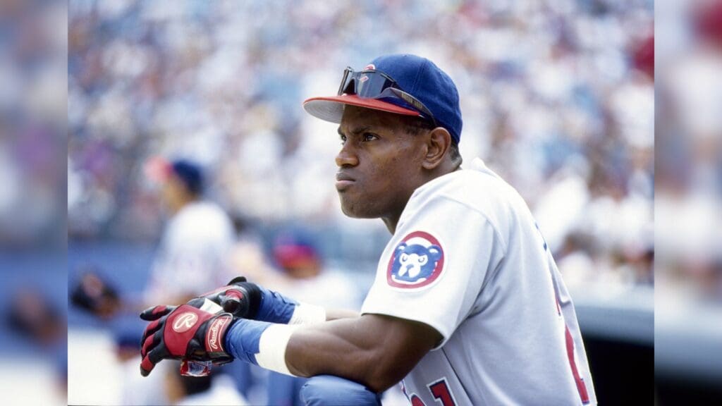 Unknown date and location, USA; FILE PHOTO; Chicago Cubs right fielder Sammy Sosa in the dugout at an unknown location.