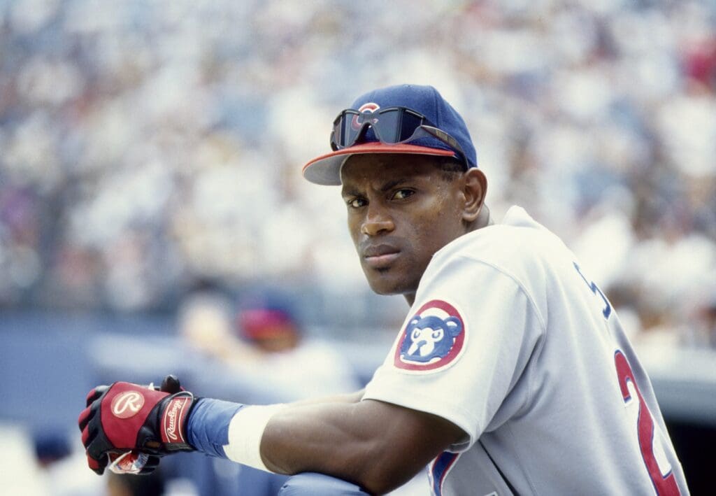 Unknown date and location, USA; FILE PHOTO; Chicago Cubs right fielder Sammy Sosa in the dugout at an unknown location.
