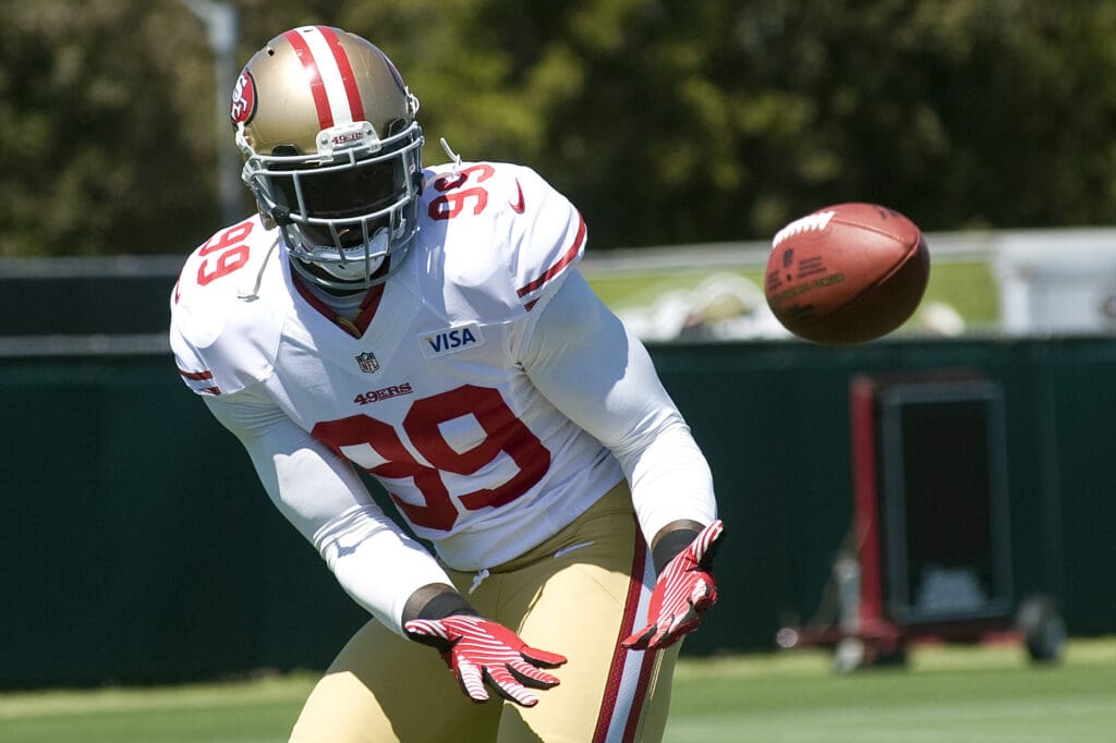 July 29, 2012; Santa Clara, CA, USA; San Francisco 49ers linebacker Aldon Smith (99) catches a pass during training camp at the 49ers practice facility.