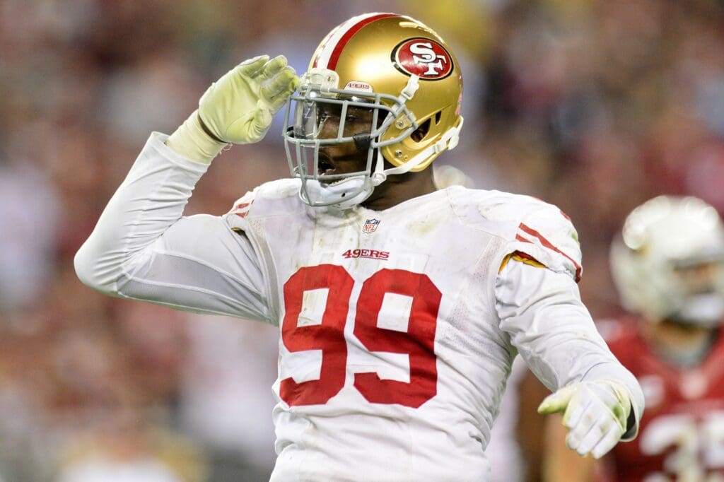 Oct 29, 2012; Glendale, AZ, USA; San Francisco 49ers outside linebacker Aldon Smith (99) celebrates after sacking Arizona Cardinals quarterback John Skelton (19) during the second half at University of Phoenix Stadium. The 49ers beat the Cardinals 24-3.