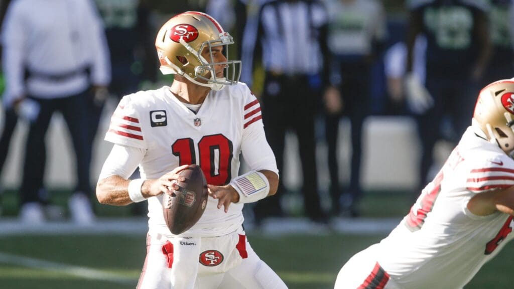 Nov 1, 2020; Seattle, Washington, USA; San Francisco 49ers quarterback Jimmy Garoppolo (10) looks to pass against the Seattle Seahawks during the first quarter at CenturyLink Field.