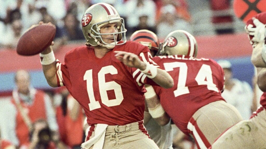Jan 22, 1989; Miami, FL, USA; FILE PHOTO; San Francisco 49ers quarterback Joe Montana (16) looks to pass the ball against the Cincinnati Bengals during Super Bowl XXIII at Joe Robbie Stadium. The 49ers defeated the Bengals 20-16.