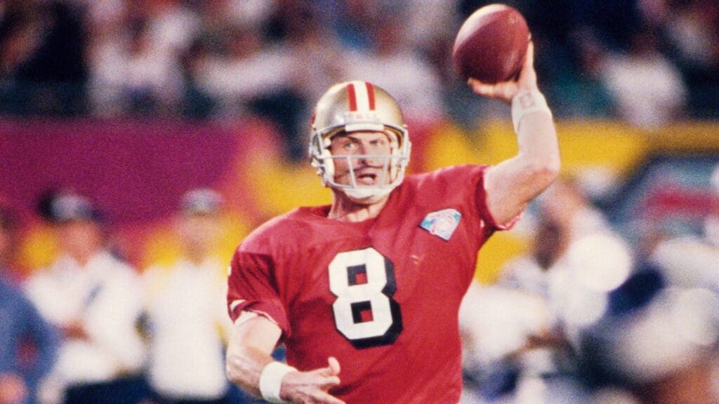 Jan 29, 1995; Miami, FL, USA; FILE PHOTO; San Francisco 49ers quarterback Steve Young (8) looks to throw against the San Diego Chargers during Super Bowl XXIX at Joe Robbie Stadium. The 49ers defeated the Chargers 49-26
