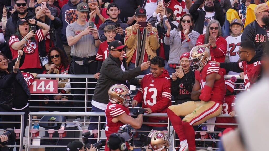 Dec 8, 2024; Santa Clara, California, USA; San Francisco 49ers wide receiver Jauan Jennings (15) celebrates with fans after scoring a touchdown against the Chicago Bears in the first quarter at Levi's Stadium.