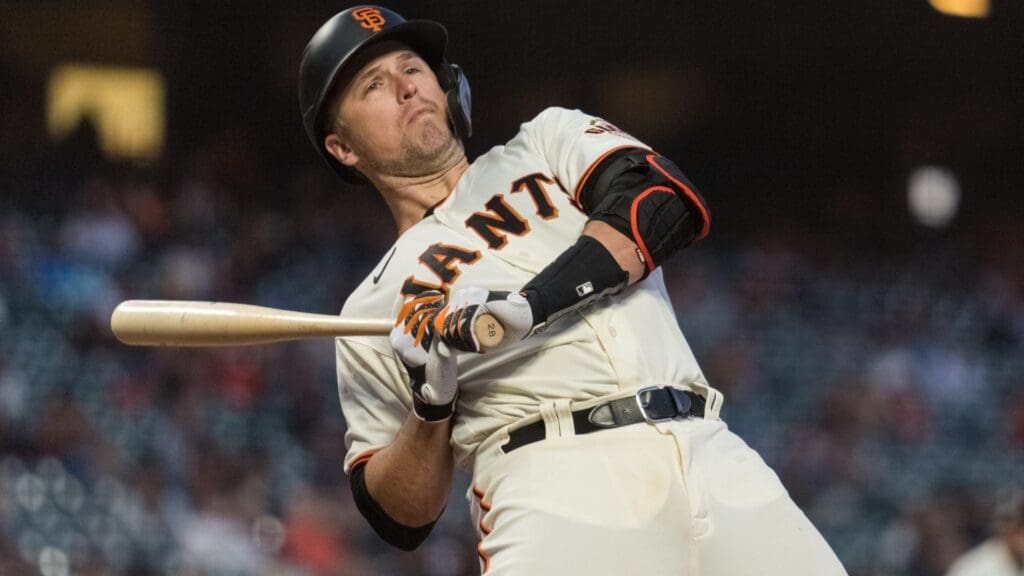 Jun 15, 2021; San Francisco, California, USA; San Francisco Giants catcher Buster Posey (28) is hit by a wild pitch from Arizona Diamondbacks starting pitcher Corbin Martin (not seen) in the fifth inning at Oracle Park.