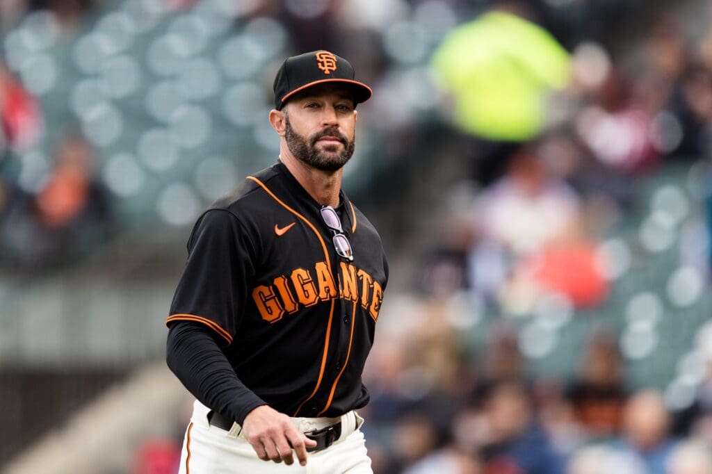 San Francisco Giants manager Gabe Kapler returns to the dugout before the game against the St. Louis Cardinals at Oracle Park.