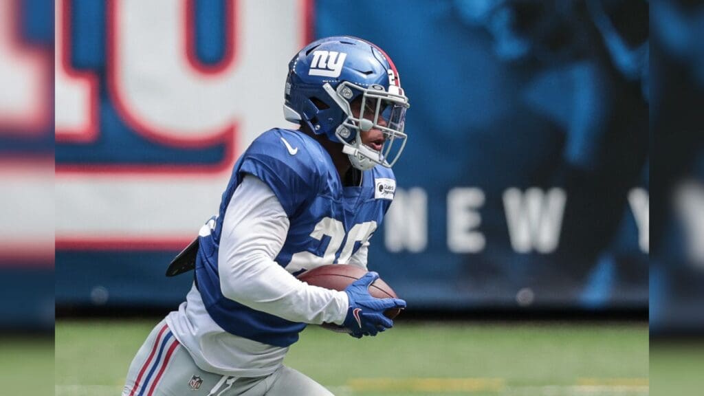 Sep 3, 2020; East Rutherford, New Jersey, USA; New York Giants running back Saquon Barkley (26) carries the ball the Blue-White Scrimmage at MetLife Stadium.