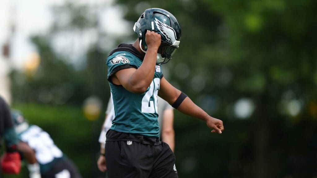 Jun 10, 2025; Philadelphia, PA, USA; Philadelphia Eagles running back Saquon Barkley (26) reacts during a practice drill at NovaCare Complex.
