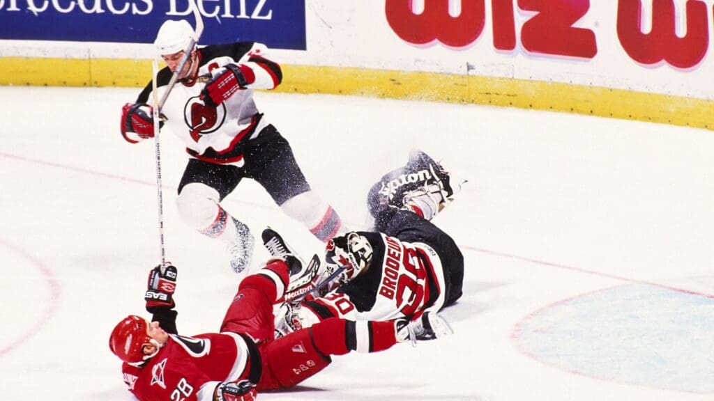 Unknown Date, 1998; East Rutherford, NJ, USA; FILE PHOTO; New Jersey Devils goalie Martin Brodeur (30) and Scott Stevens (4) in action against the Carolina Hurricanes at Continental Airlines Arena.