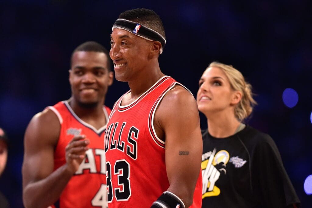 Feb 14, 2015; New York, NY, USA; Team Millsap forward Paul Millsap of the Atlanta Hawks (4, left), legend Scottie Pippen (center), and guard Elena Delle Donne of the Chicago Sky (11, right) during the 2015 NBA All Star Shooting Stars competition at Barclays Center.
