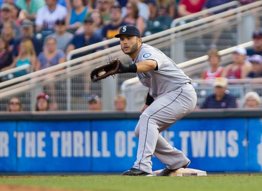 Jul 31, 2015; Minneapolis, MN, USA; Seattle Mariners first baseman Jesus Montero (63) catches the ball for an out in the fourth inning against the Minnesota Twins at Target Field.