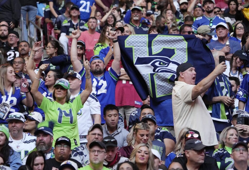Seattle Seahawks fans cheer during the fourth quarter against the Arizona Cardinals at State Farm Stadium in Glendale on Dec. 8, 2024.