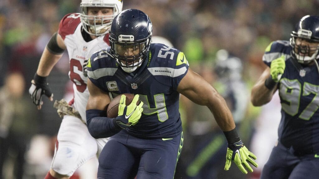 Nov 15, 2015; Seattle, WA, USA; Seattle Seahawks linebacker Bobby Wagner (54) recovers a fumble for a touchdown during the fourth quarter in a game against the Arizona Cardinals at CenturyLink Field. The Cardinals won 39-32.