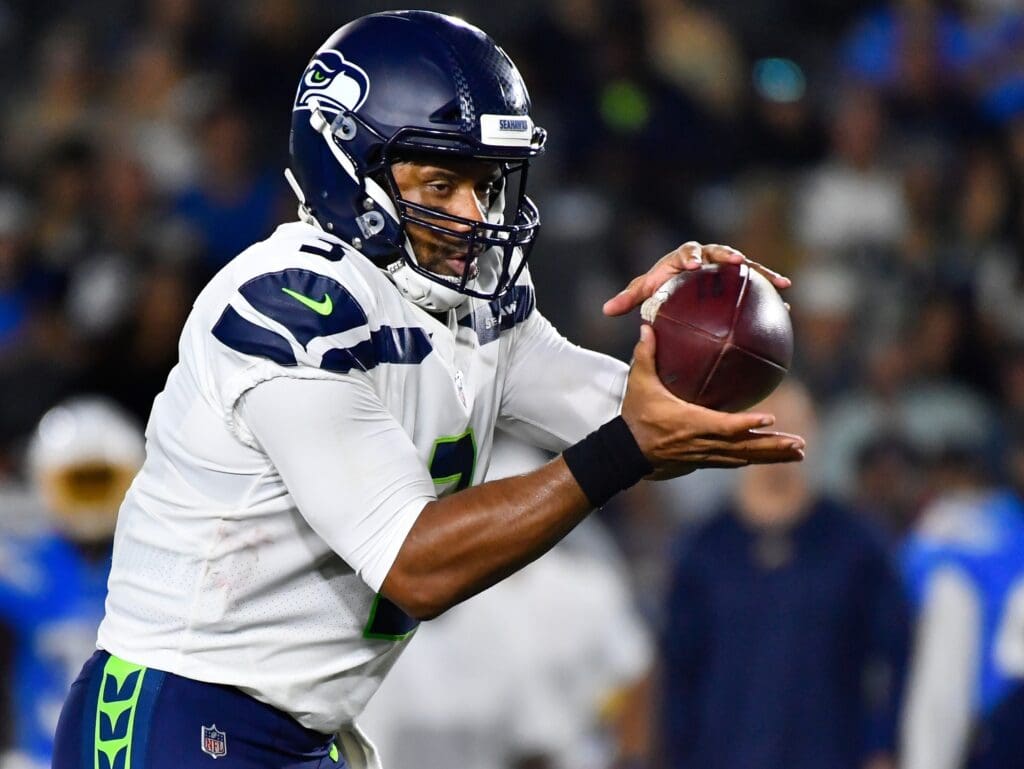Aug 24, 2019; Carson, CA, USA; Seattle Seahawks quarterback Russell Wilson (3) takes the snap against the Los Angeles Chargers during the second quarter at Dignity Health Sports Park