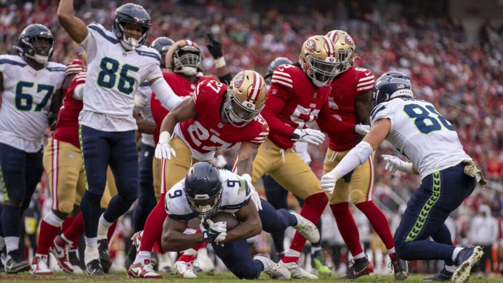November 17, 2024; Santa Clara, California, USA; Seattle Seahawks running back Kenneth Walker III (9) scores a touchdown during the third quarter against the San Francisco 49ers at Levi's Stadium