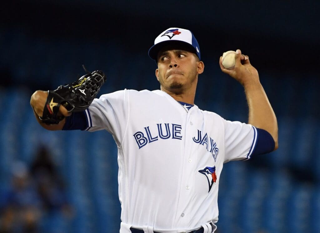 Sep 20, 2018; Toronto, Ontario, CAN; Toronto Blue Jays relief pitcher Jose Fernandez (50) delivers a pitch against Tampa Bay Rays in the sixth inning at Rogers Centre.