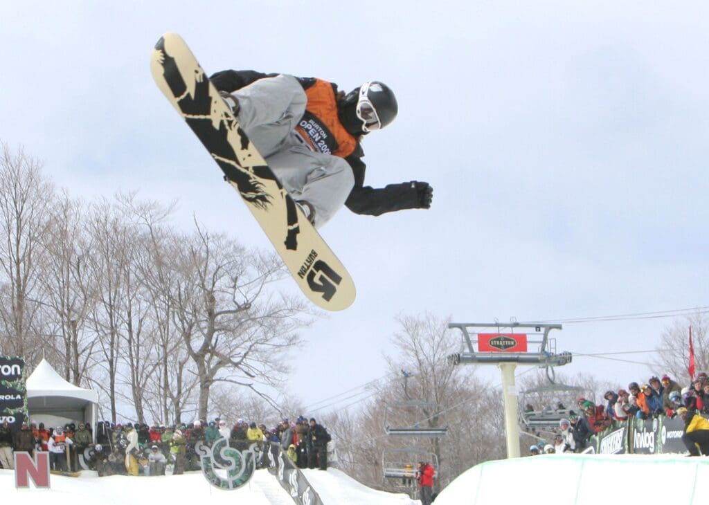 Olympic gold medalist Shaun White flies through the air on his way to winning the mens halfpipe, at the U.S. Open Snowboarding Championships, at Stratton Mountain Vermont March 18, 2006.