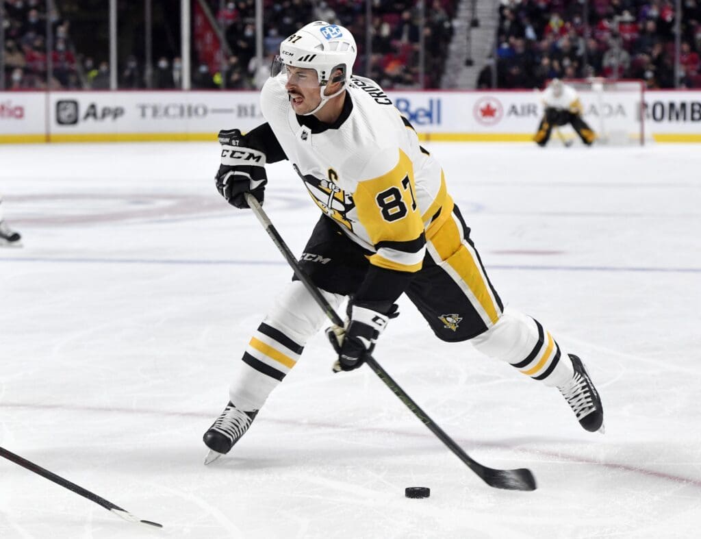 Nov 18, 2021; Montreal, Quebec, CAN; Pittsburgh Penguins forward Sidney Crosby (87) shoots the puck during the first period of the game against the Montreal Canadiens at the Bell Centre