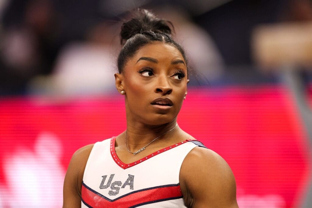 Jun 30, 2024; Minneapolis, Minnesota, USA; Simone Biles looks on prior to the U.S. Olympic Team Gymnastics Trials at Target Center.