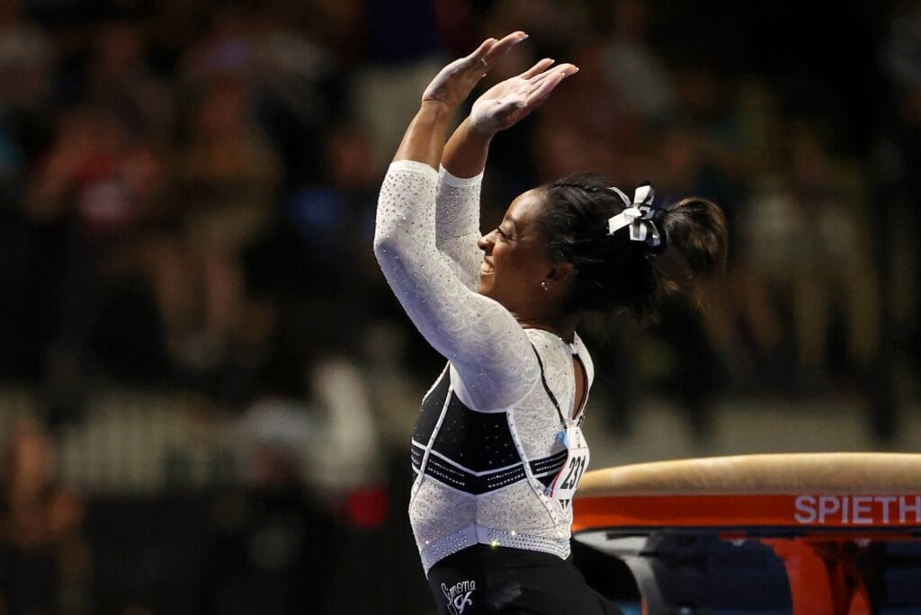 Aug 5, 2023; Hoffman Estates, Illinois, USA; Simone Biles reacts after her vault during the Core Hydration Classic at NOW Arena