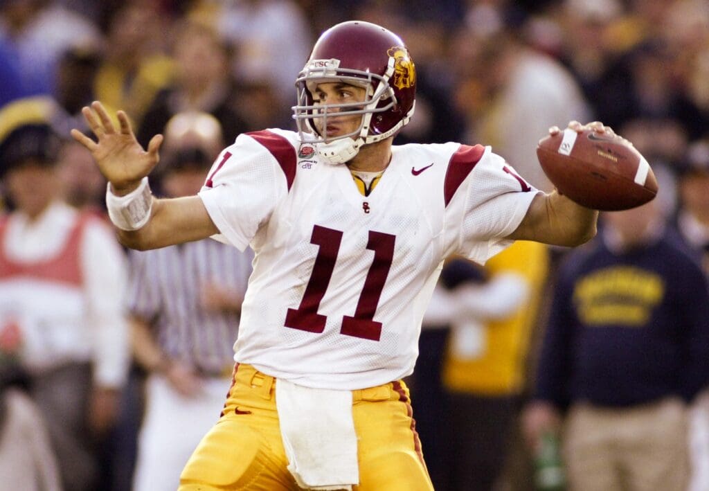 Jan 1, 2004; Pasadena, CA, USA: FILE PHOTO; Southern California Trojans quarterback Matt Leinart (11) in action against the Michigan Wolverines during the 2004 Rose Bowl at the Rose Bowl. The Trojans defeated the Wolverines 28-14.