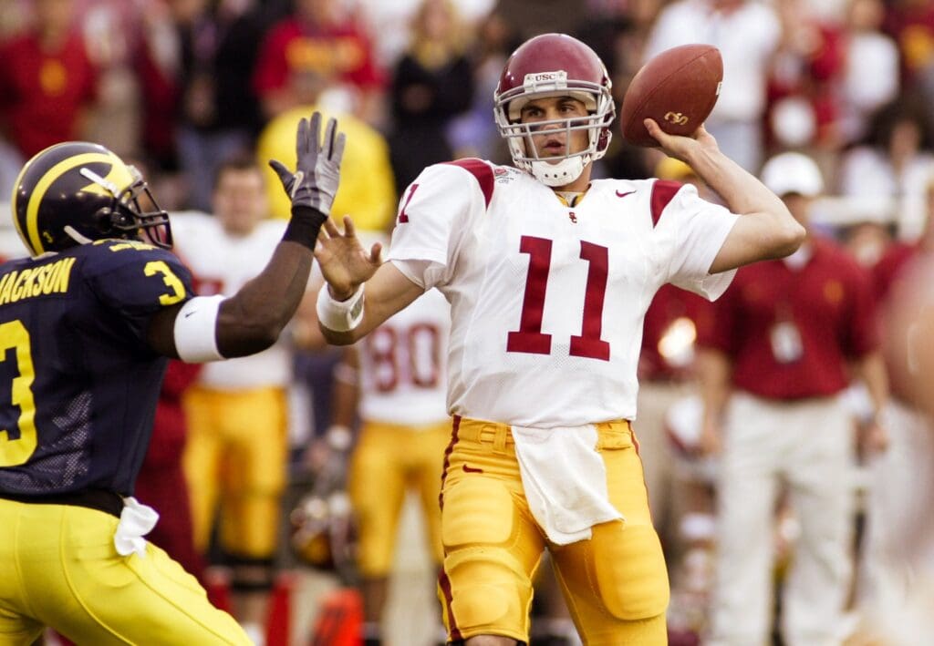 Jan 1, 2004; Pasadena, CA, USA: FILE PHOTO; Southern California Trojans quarterback Matt Leinart (11) in action against the Michigan Wolverines during the 2004 Rose Bowl at the Rose Bowl. The Trojans defeated the Wolverines 28-14.