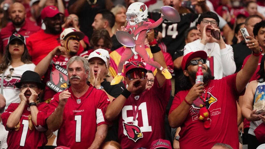 Cardinals fans cheer on the team against the Commanders during a game at State Farm Stadium in Glendale on Sept. 29, 2024.