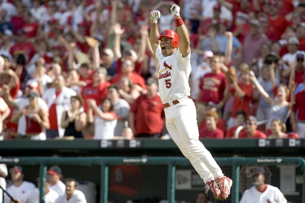 April 16, 2006 St. Louis, MO, USA; St. Louis Cardinals first baseman Albert Pujols (5) celebrates his walk-off, two-run home run against the Cincinnati Reds at Busch Stadium. It was Pujols' third home run of the day. The Cards beat the Reds 8-7.