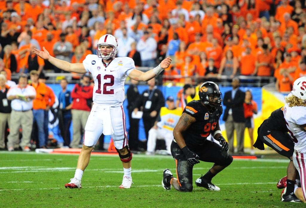 Jan 2, 2012; Glendale, AZ, USA; Stanford Cardinal quarterback Andrew Luck reacts in the fourth quarter against the Oklahoma State Cowboys in the 2012 Fiesta Bowl at University of Phoenix Stadium. Oklahoma State defeated Stanford 41-38 in overtime