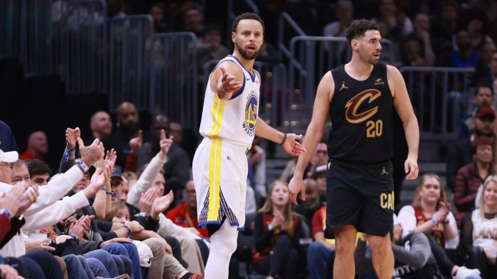 Nov 5, 2023; Cleveland, Ohio, USA; Golden State Warriors guard Steph Curry (30) questions a call after losing a ball out of bounds while defended by Cleveland Cavaliers guard Georges Niang (20) in the second quarter at Rocket Mortgage FieldHouse.