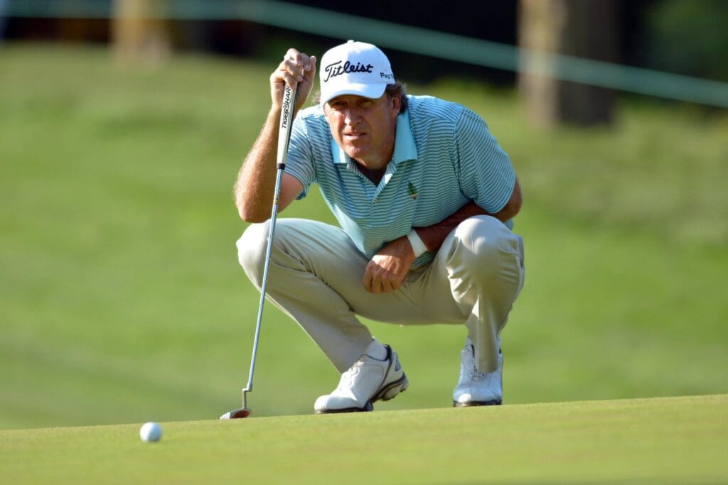Jul 12, 2013; Omaha, NE, USA; Steve Jones lines up his putt on the second hole during the second round of the 2013 U.S. Senior Open at the Omaha Country Club