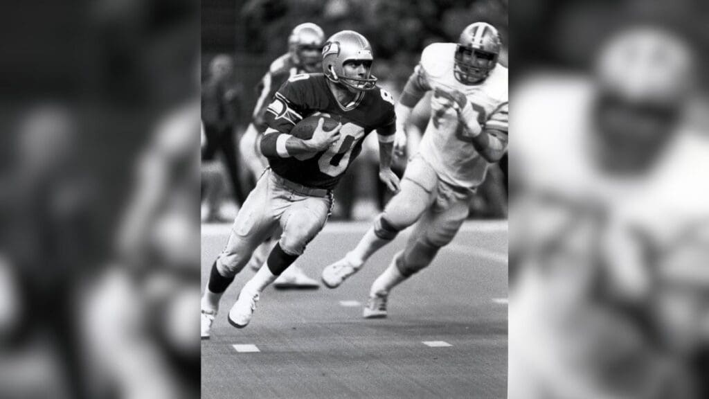 Dec 2, 1984, Seattle, WA, USA; FILE PHOTO; Seattle Seahawks wide receiver Steve Largent (80) carries the ball while being pursued by Detroit Lions defensive tackle Doug English at the Kingdome.