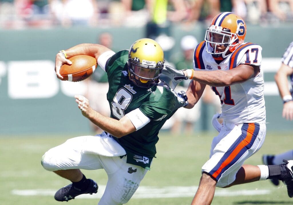 October 18, 2008; Tampa FL, USA; Syracuse safety A.J. Brown (17) tackles South Florida Bulls quarterback Matt Grothe (8) during the first half at Raymond James Stadium.