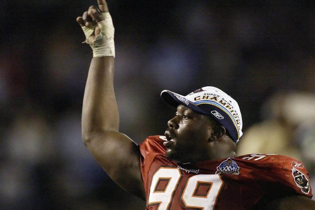 Jan 26, 2003; San Diego, CA, USA; FILE PHOTO; Tampa Bay Buccaneers defensive tackle Warren Sapp (99) celebrates after the victory against the Oakland Raiders in Super Bowl XXXVII at Qualcomm Stadium. The Bucs defeated the Raiders 48-21.