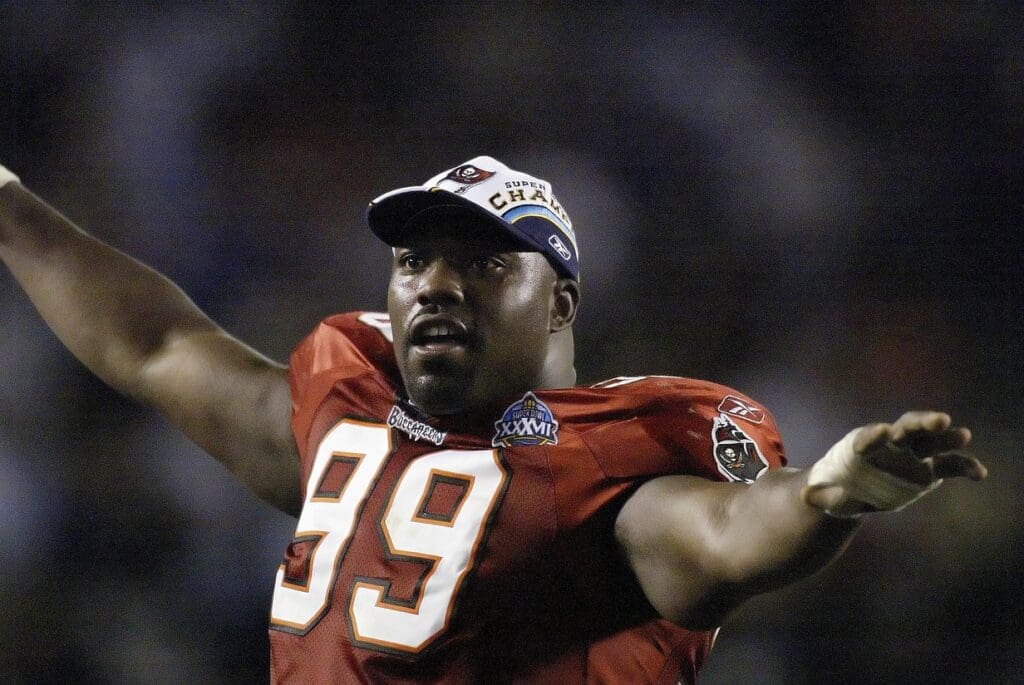 Jan 26, 2003; San Diego, CA, USA; FILE PHOTO; Tampa Bay Buccaneers defensive tackle Warren Sapp (99) celebrates after the victory against the Oakland Raiders in Super Bowl XXXVII at Qualcomm Stadium. The Bucs defeated the Raiders 48-21.