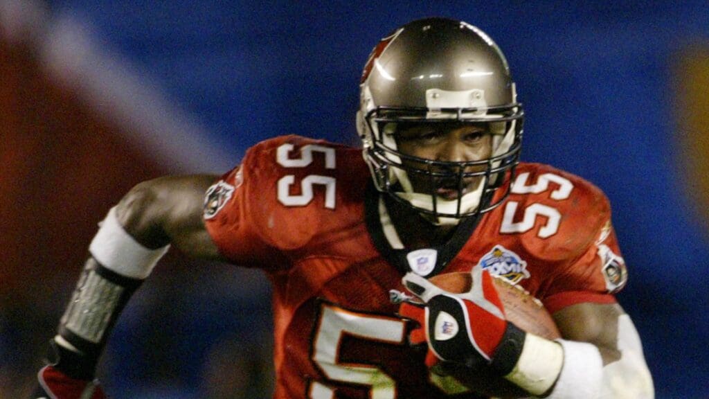 Jan 26, 2003; San Diego, CA, USA; FILE PHOTO; Tampa Bay Buccaneers linebacker Derrick Brooks (55) returns an interception against the Oakland Raiders during Super Bowl XXXVII at Qualcomm Stadium. The Bucs defeated the Raiders 48-21.
