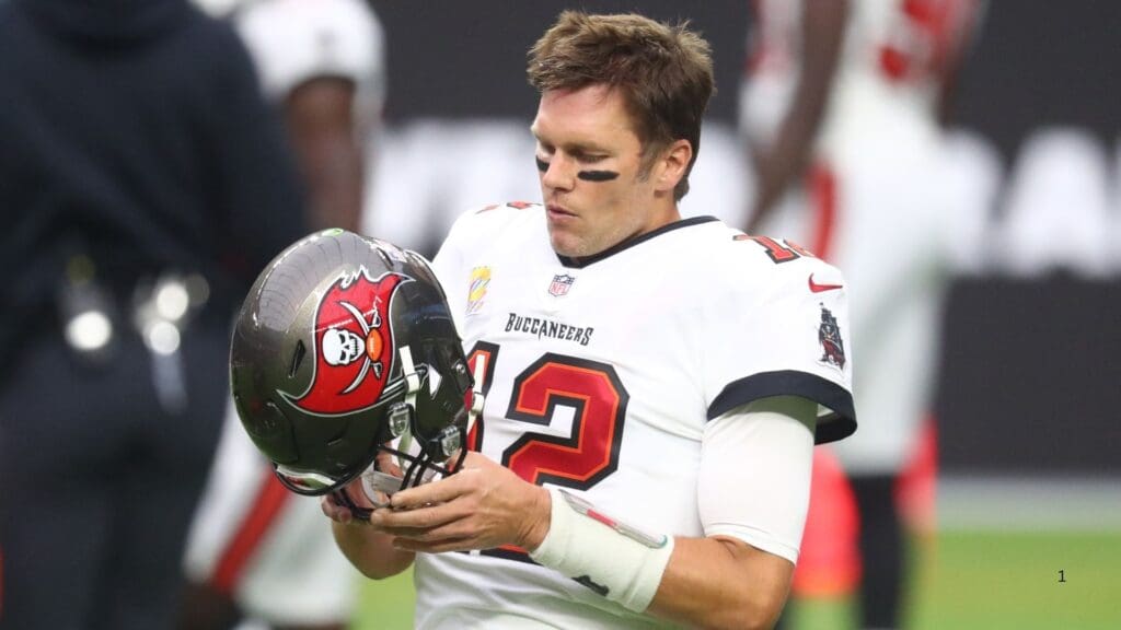 Oct 25, 2020; Paradise, Nevada, USA; Tampa Bay Buccaneers quarterback Tom Brady (12) puts on his helmet against the Las Vegas Raiders at Allegiant Stadium.