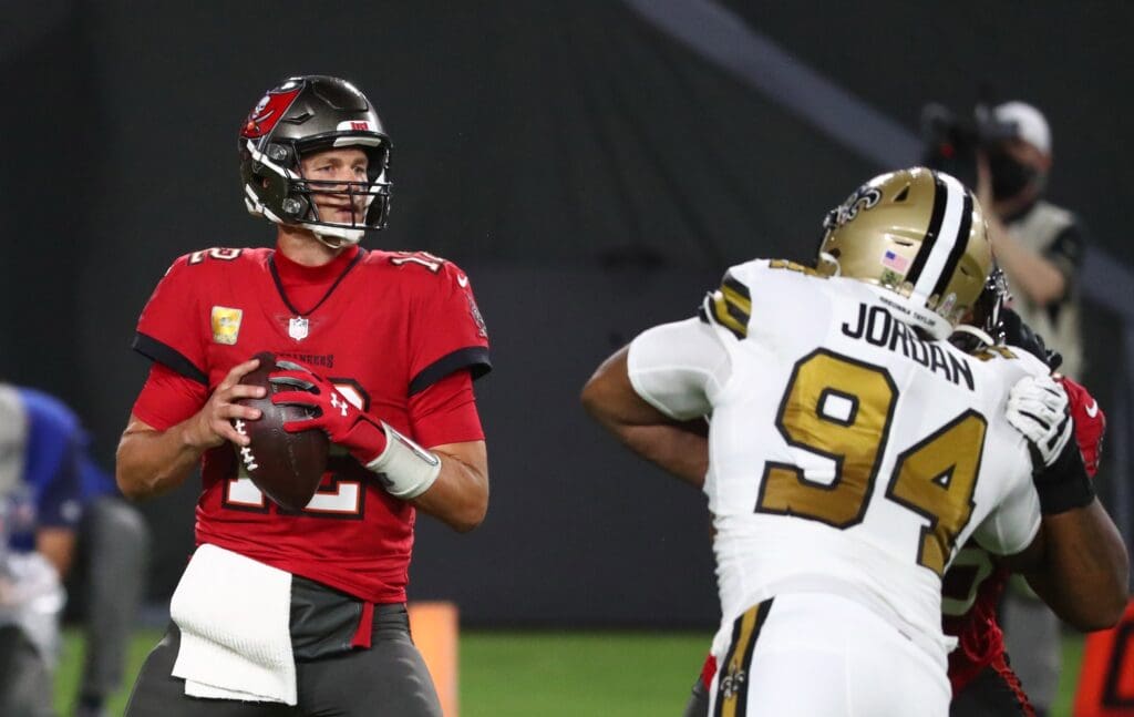 Nov 8, 2020; Tampa, Florida, USA; Tampa Bay Buccaneers quarterback Tom Brady (12) drops back to pass against the New Orleans Saints in the first quarter of a NFL game at Raymond James Stadium.
