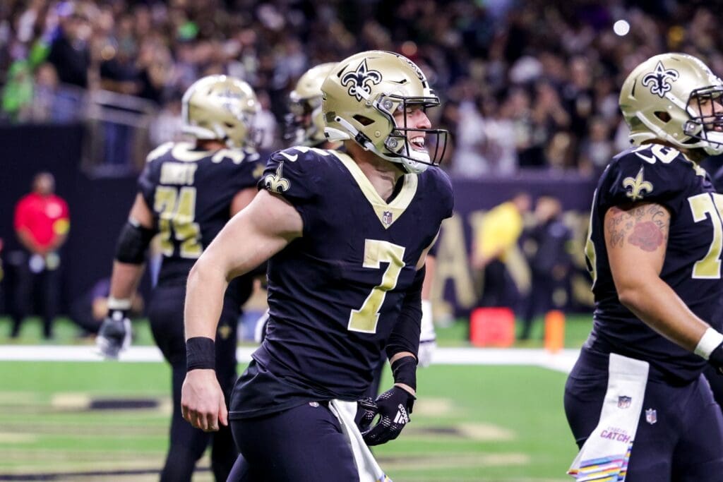 Oct 9, 2022; New Orleans, Louisiana, USA; New Orleans Saints tight end Taysom Hill (7) celebrates a touchdown with tight end Adam Trautman (82) against the Seattle Seahawks during the second half at Caesars Superdome