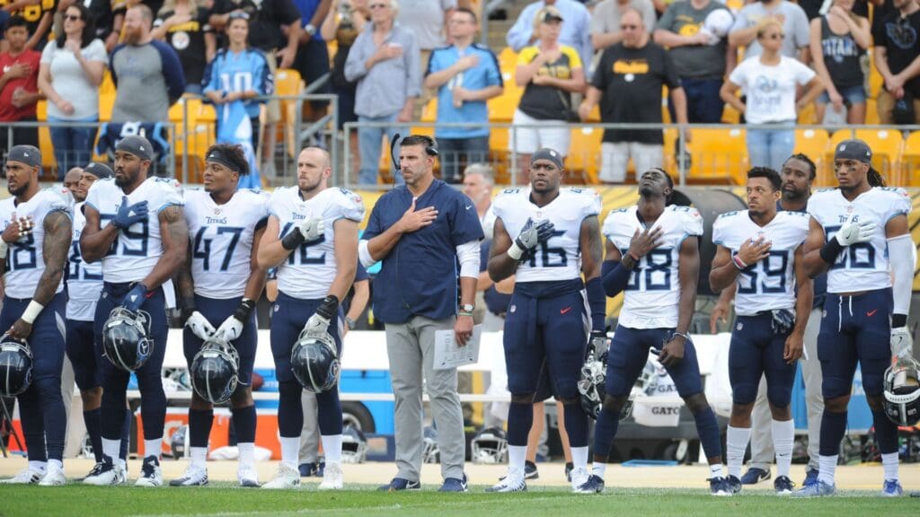 Aug 25, 2018; Pittsburgh, PA, USA; Tennessee Titans head coach Mike Vrabel and his team stand for the National Anthems before playin the Pittsburgh Steelers at Heinz Field.