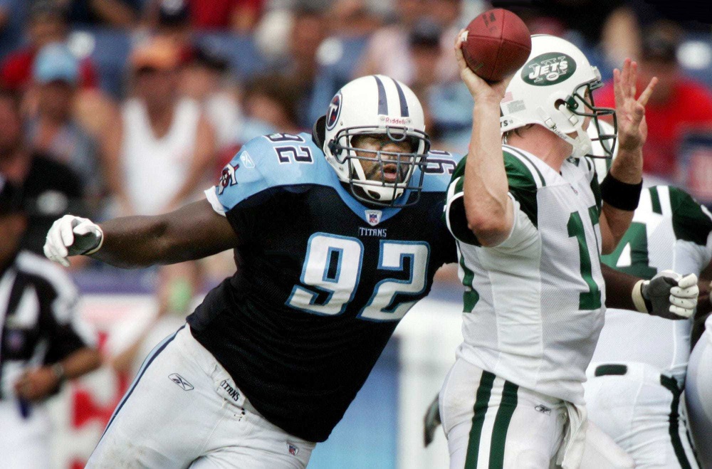 Tennessee Titans defensive tackle Albert Haynesworth (92) pressures New York Jets quarterback Chad Pennington (10) at LP Field in Nashville on Sep. 10, 2006. The Titans lost their home and season opener 23-16.