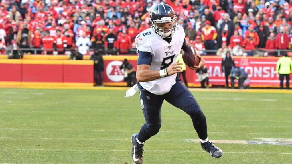 Jan 19, 2020; Kansas City, Missouri, USA; Tennessee Titans quarterback Marcus Mariota (8) runs the ball during the AFC Championship Game against the Kansas City Chiefs at Arrowhead Stadium.