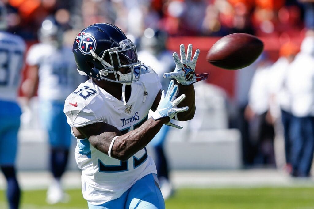 Oct 13, 2019; Denver, CO, USA; Tennessee Titans running back Dion Lewis (33) warms up before the game against the Denver Broncos at Empower Field at Mile High