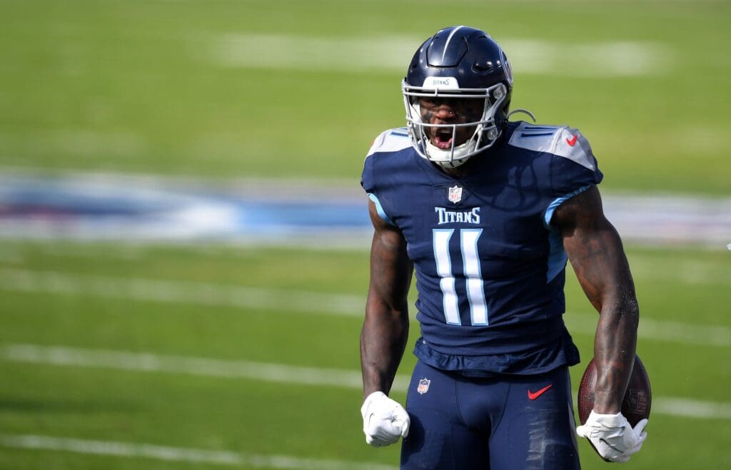 Jan 10, 2021; Nashville, Tennessee, USA; Tennessee Titans wide receiver A.J. Brown (11) reacts after a catch against the Baltimore Ravens during the first quarter in a AFC Wild Card playoff game at Nissan Stadium