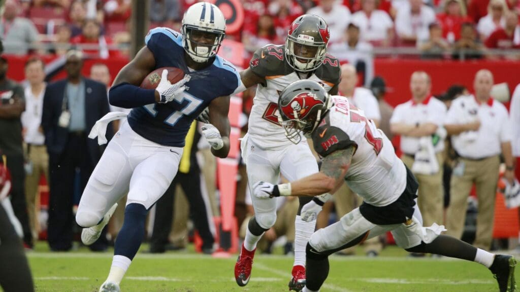 Sep 13, 2015; Tampa, FL, USA; Tennessee Titans wide receiver Dorial Green-Beckham (17) runs with the ball as Tampa Bay Buccaneers defensive back Chris Conte (23) attempts to defend during the second half at Raymond James Stadium. Tennessee Titans defeated the Tampa Bay Buccaneers 42-14.