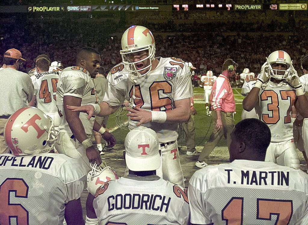 Jan 2, 1998; Miami, FL, USA; Tennessee Volunteers quarterback Peyton Manning (16) tries to get his team mates pumped up for the fourth quarter of the Orange Bowl against Nebraska at Pro Player Stadium.
