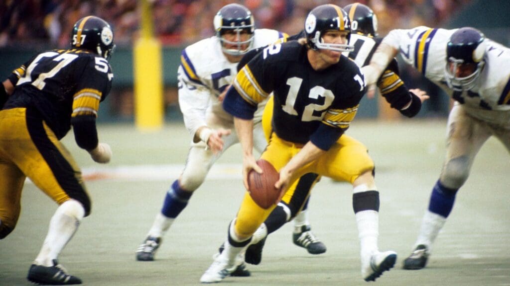 Nov 26, 1972; Pittsburgh, PA, USA; FILE PHOTO; Pittsburgh Steelers quarterback (12) Terry Bradshaw in action against the Minnesota Vikings at Three Rivers Stadium. The Steelers defeated the Vikings 23-10.