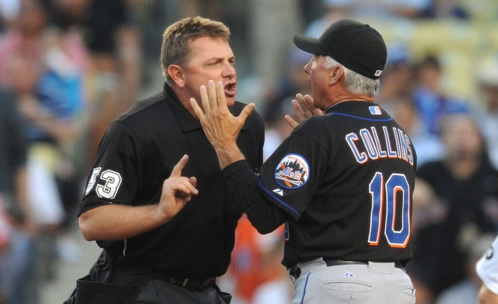 July 7, 2011; Los Angeles, CA, USA; New York Mets manager Terry Collins (10) argues with home plate umpire Greg Gibson (53) on a call at the plate during the second inning against the Los Angeles Dodgers at Dodger Stadium